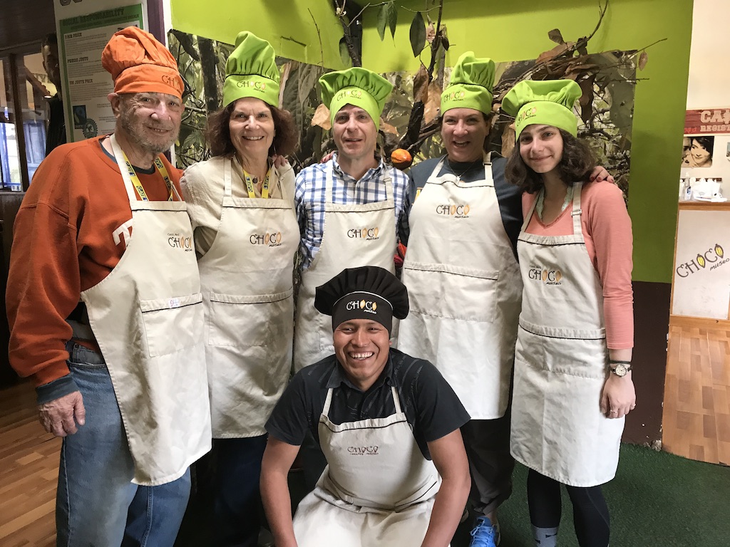 Michele and family doing a chocolate cooking class in Peru