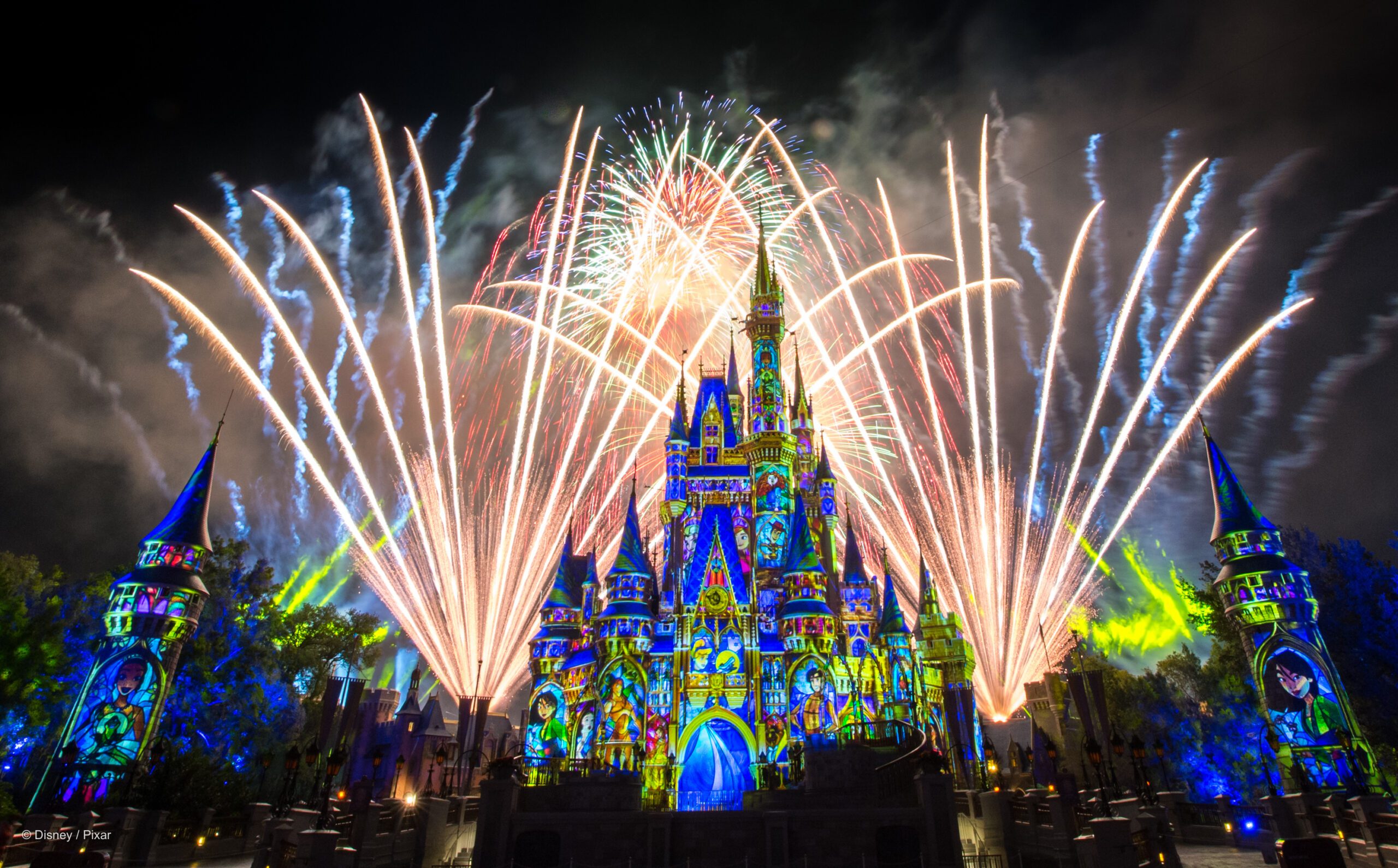 "Iconic Disney castle and thrilling Universal Studios roller coaster capturing theme park magic" 