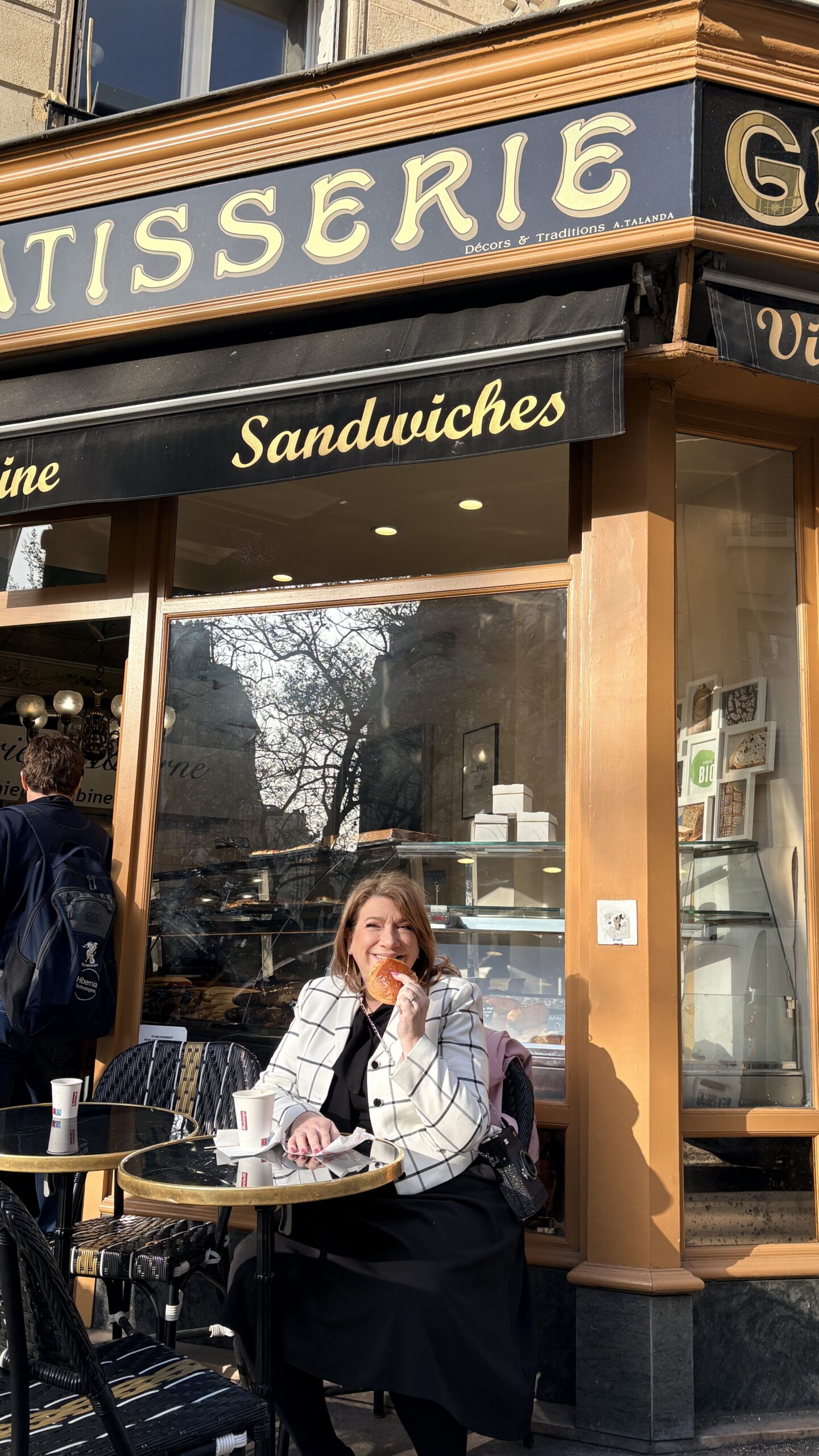 Outdoor seating at Café de Flore in Paris, bustling with tourists and locals