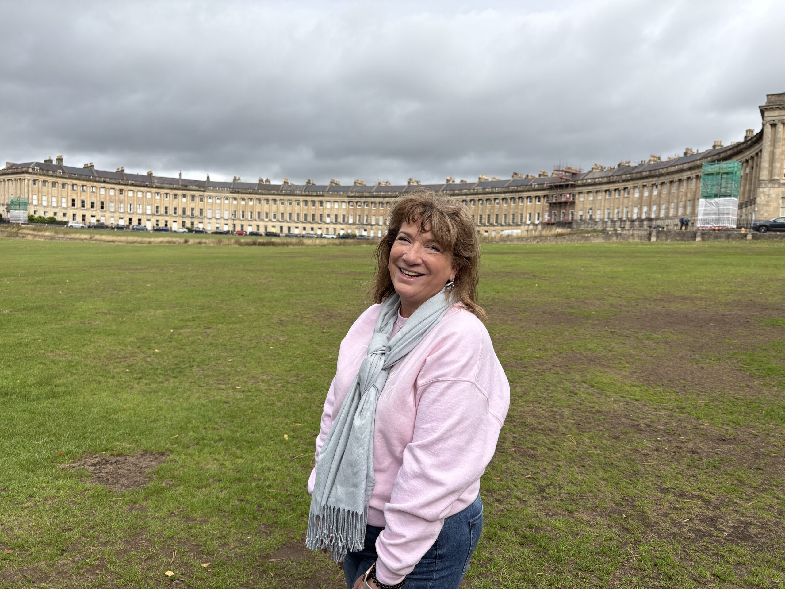 Michele at Crescent Court. Cinematic European street scene evoking the magic of set-jetting travel