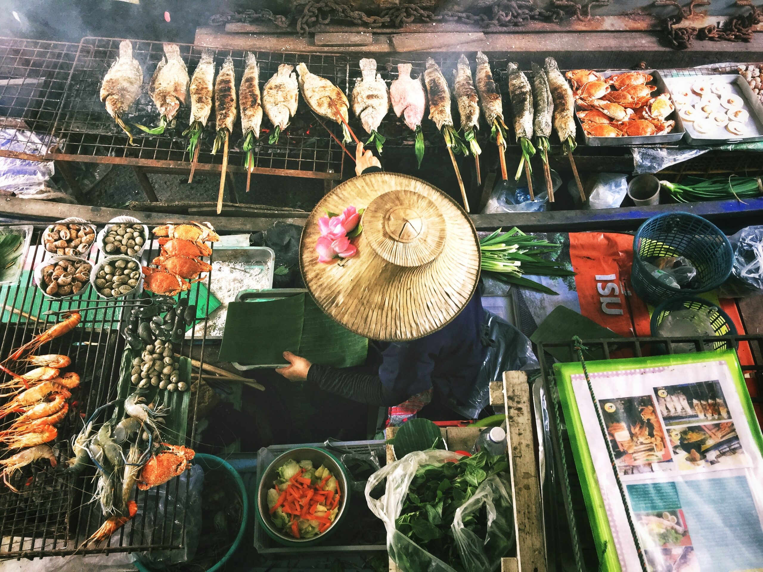 Woman traveler exploring Thailand temple market experiencing set-jetting adventure