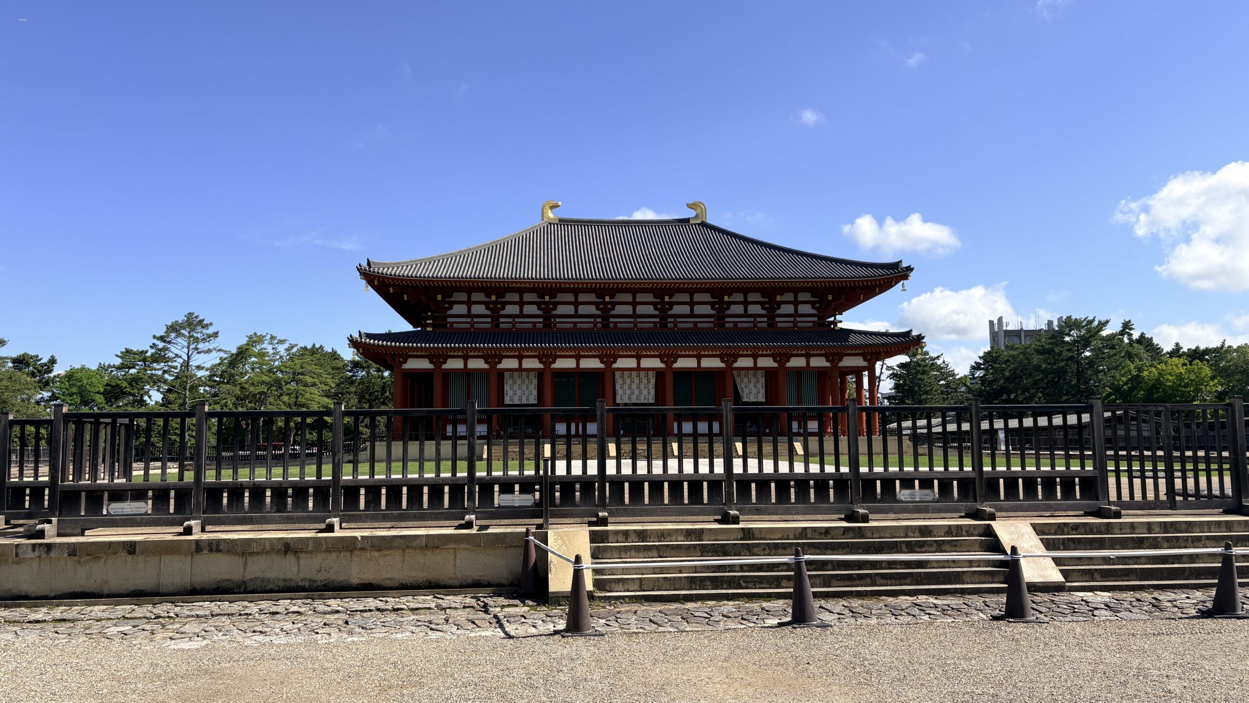 Michele Schwartz walking through Japanese Nara Buddist Temple experiencing real Shogun era history